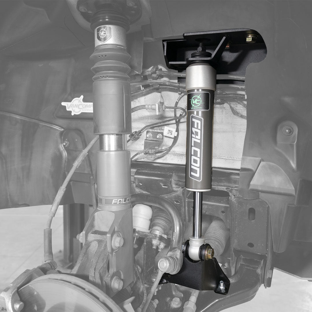 Close-up of the Stage 1 System - Sprinter AWD, 4x4 (2019-Present 2500) by Van Compass, highlighting the Falcon 2.1 Monotube shocks and bump stop upgrades.