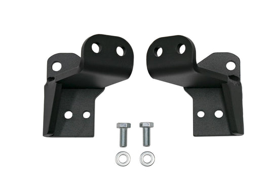 FRONT JOUNCE REINFORCEMENT BRACKET - SPRINTER 4X4 (2015-2022): Black metal brackets with screws and bolts for enhancing front suspension durability in rough terrains.