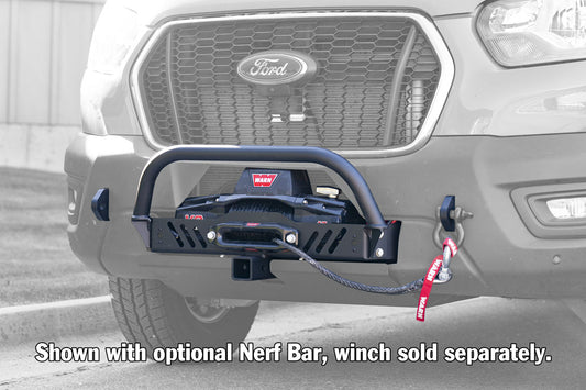 Installed image of front winch bumper for Ford Transit, featuring integrated shackle recovery points and front receiver, compatible with sensors, by Van Compass.