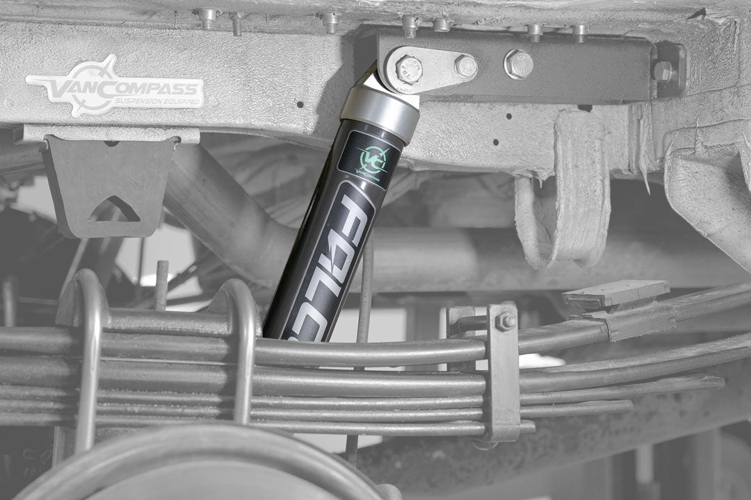STAGE 3 SYSTEM - SPRINTER 2WD (2007+ 2500) by VAN COMPASS: Close-up of black Falcon 2.1 Monotube Shock, highlighting its robust design and superior damping capabilities for improved van handling.