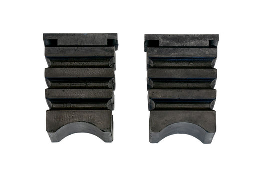 SUMO SPRING REAR BUMP STOPS - SPRINTER (1994+ 3500 ONLY) PAIR: Close-up of black rubber pads designed to replace factory rear bump stops for enhanced suspension performance.