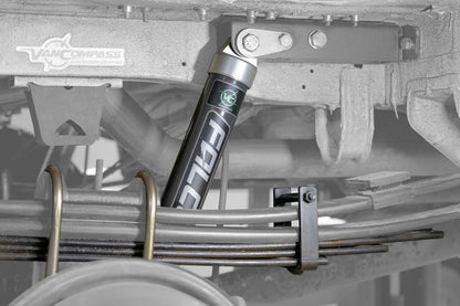 Stage 3 System - Sprinter AWD, 4x4 (2019-Present 2500 Only) by Van Compass: Close-up of Falcon 2.1 Monotube shock and rear mini leaf spring for enhanced vehicle handling and stability.