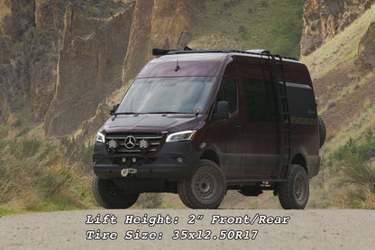 Van Compass Striker AWD 2 Lift Kit on a parked van, showcasing enhanced ground clearance and tire fitment for off-road capability.