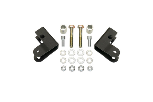 REAR HIGH CLEARANCE SHOCK EXTENSION BRACKETS - TRANSIT (2013+) by VAN COMPASS: A collection of metal parts and nuts designed to improve under axle ground clearance and protect shocks.