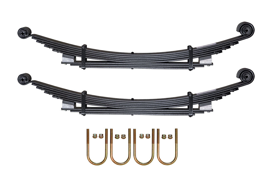 STAGE 4.3 DUALLY SYSTEM - SPRINTER AWD, 4X4 (2015-PRESENT 3500) by VAN COMPASS: Close-up of adjustable black metal shock absorbers with screws, designed for enhanced van handling and stability.