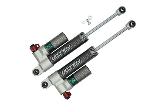 A pair of Falcon 3.3 SP2 Fast Adjust Rear Shocks for Sprinter 4x4 (2015+ 3500), showcasing robust design and adjustable damping settings.