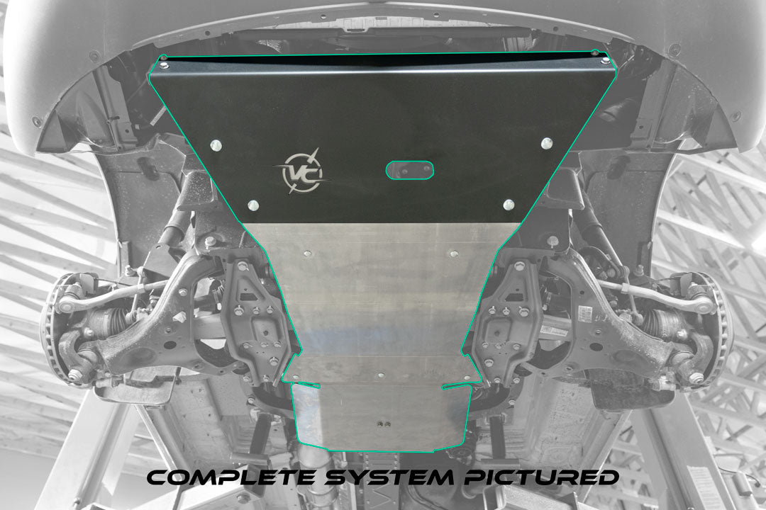ENGINE SKID PLATE - SPRINTER AWD (2023+ 2500) by VAN COMPASS, a black powder-coated metal plate featuring a logo, designed for off-road protection and easy installation.