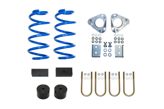 TOPO 2.0 Front and Rear Lift Kit for Transit (2015-Present) by Van Compass, showcasing blue springs and various metal parts designed for suspension enhancement.