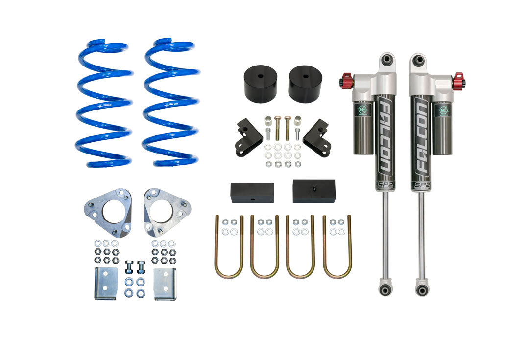 STAGE 2 TOPO 2.0 SYSTEM - TRANSIT AWD (2020+ SINGLE OR DUAL REAR WHEEL) includes blue springs, metal parts, and Falcon shock absorbers for enhanced vehicle suspension.