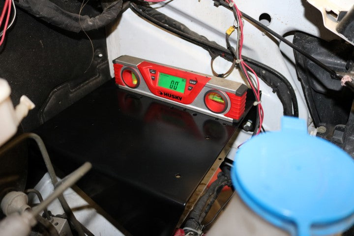 AIR SYSTEM MOUNT - SPRINTER (2007-2018) by VAN COMPASS, shown as a red and black digital device designed to fit a Viar 2.0 Gallon air tank.