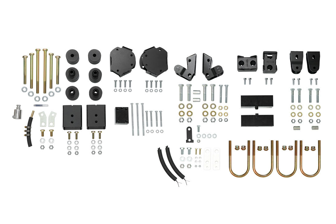 STRIKER 2 Lift Kit (Complete) - Sprinter 2WD (2007-2018) by Van Compass, featuring black metal parts, bolts, nuts, and lift blocks for enhanced off-road clearance.