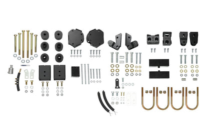 STRIKER 2 Lift Kit (Complete) - Sprinter 2WD (2007-2018) by Van Compass, featuring black metal parts, bolts, nuts, and lift blocks for enhanced off-road clearance.