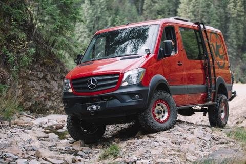 Front Sway Bar Disconnect Kit for Sprinter 4x4 (2015-2018) showcased with a red van on a rocky road, enhancing suspension articulation and traction.